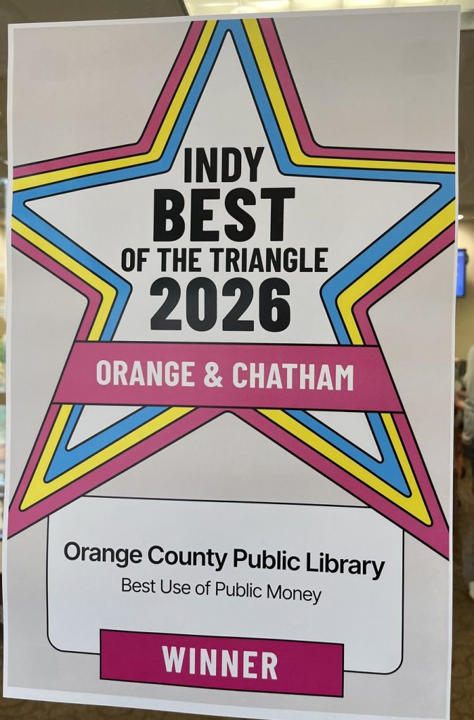 Poster on the library door: INDY Best of the Triangle 2026, Orange and Chatham. Orange County Public Library, Best Use of Public Money, Winner.
