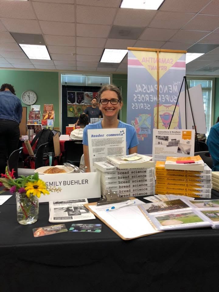 Emily Buehler at her table at the Local Author Book Fair.
