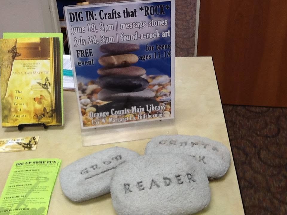 Message stones from the teen craft series, beside the summer’s Reading Together novel
