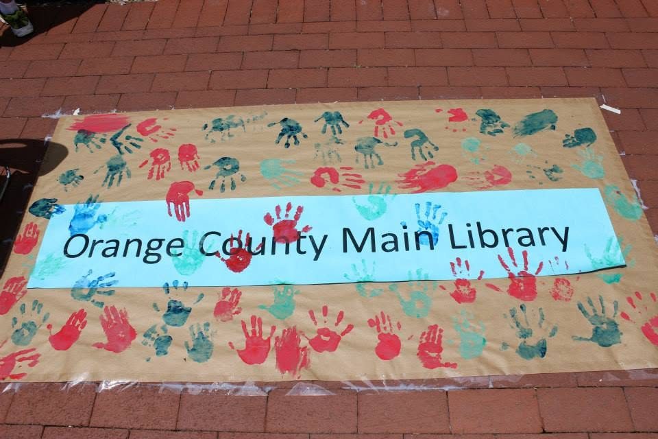 A banner of handprints for the Main Library
