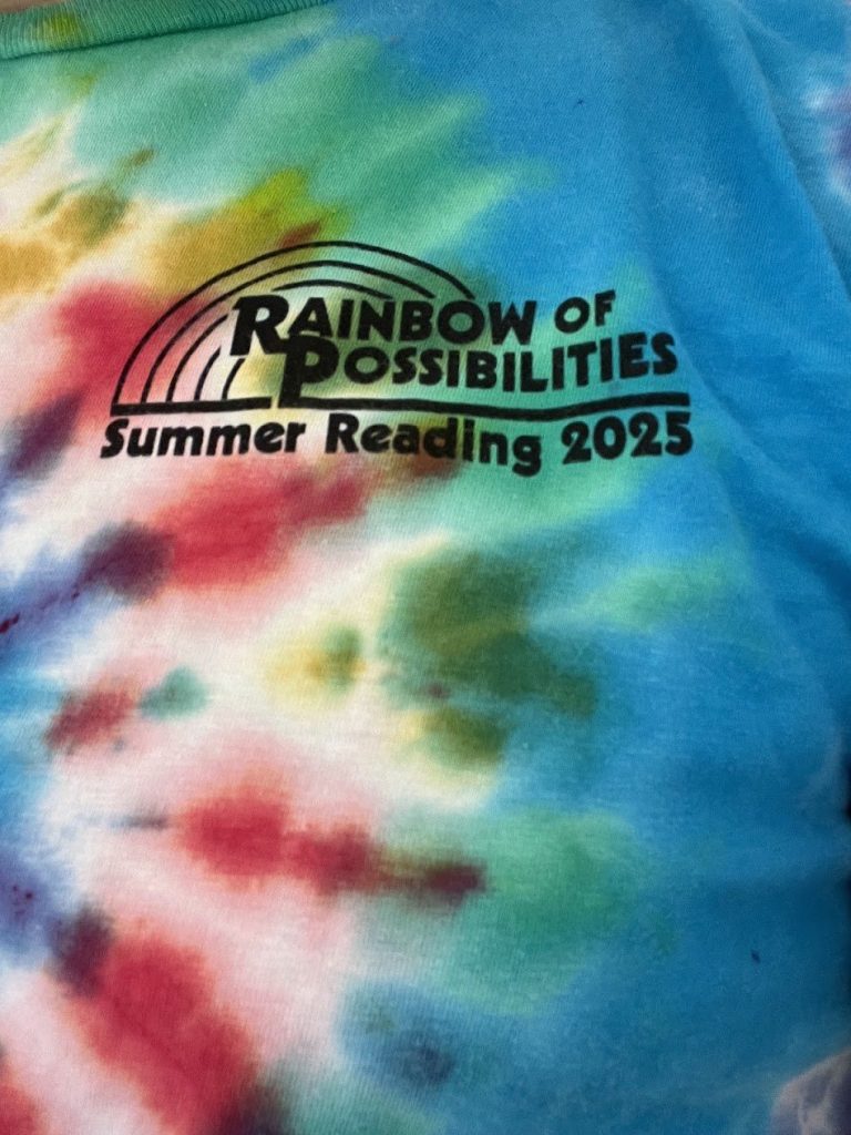 The board’s tie-dyed Rainbow of Possibilities shirts