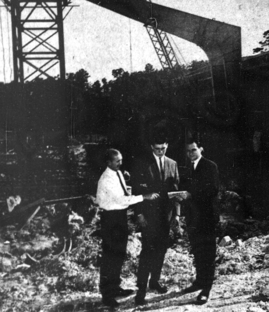Ken Rosemond, Larry Miller and Dean Smith at Carmichael Auditorium construction, about 1964-1965